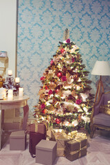 Luxury interior of living room with decorated Christmas tree and gifts on the wooden floor