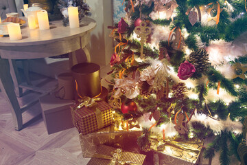 Luxury interior of living room with decorated Christmas tree and gifts on the wooden floor