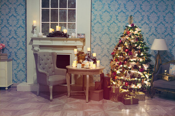 Luxury interior of living room with decorated Christmas tree and gifts on the wooden floor