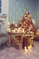 Luxury interior of living room with decorated Christmas tree and gifts on the wooden floor