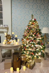 Luxury interior of living room with decorated Christmas tree and gifts on the wooden floor