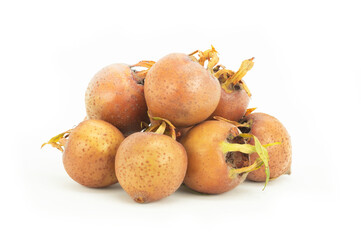 Fresh ripe organic common medlar fruit isolated on white background. Healthy food Mespilus germanica