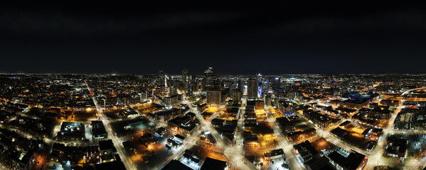 panorama of city skyline at night with city lights Denver Colorado
