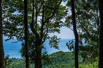 Island panoramic natural green view, blue clear ocean water
