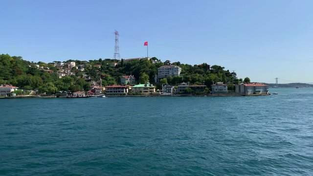 Footage of Anadolu hisari / Kandilli area of Istanbul by Bosphorus. Beautiful scene. It is a sunny summer day. Camera moves forward.