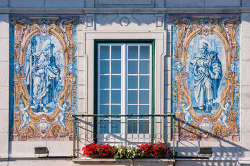 Details of the tiles with religious symbols of the City Hall of Cascais, in Portugal