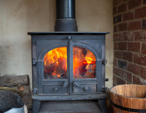 Wood burner with fire lit feeling cozy in winter