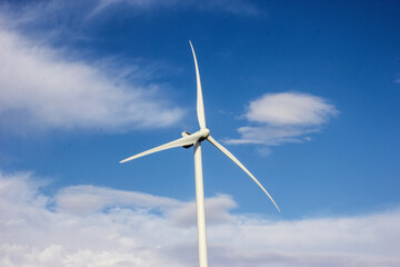Fototapeta premium Landscape with Turbine Green Energy Electricity, Windmill for electric power production, Wind turbines generating electricity on rice field. Clean energy concept.