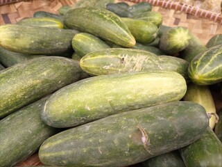 vegetables in traditional markets. tomatoes, cucumbers, carrots, broccoli, red squash, white squash, and many other vegetables
