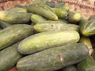 vegetables in traditional markets. tomatoes, cucumbers, carrots, broccoli, red squash, white squash, and many other vegetables
