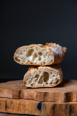 Various rustic bread on a wooden board. Healthy food and farming concept