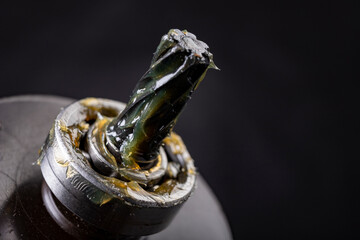 Grease lubrication of the bearing and the pin of the electric rotor. Service work of engine parts....