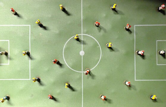 Directly Above Shot Of Figurines On Artificial Soccer Field