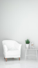 white chair in white meditation space with a table and a plant