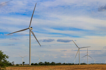 Wind turbines in a field. Renewable energy