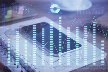 Double exposure of forex chart drawing and cell phone background. Concept of financial data analysis