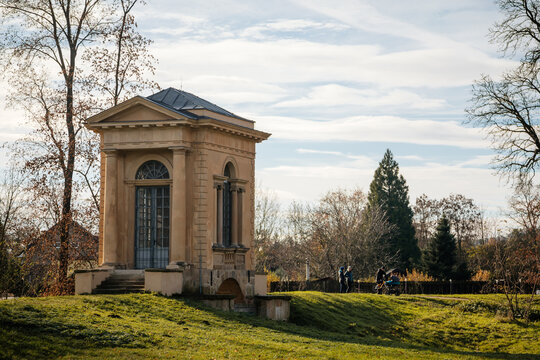 Classicist style Laudon's Pavilion in castle park in sunny autumn day, gazebo in the garden, Veltrusy chateau, Central Bohemia, Czech republic