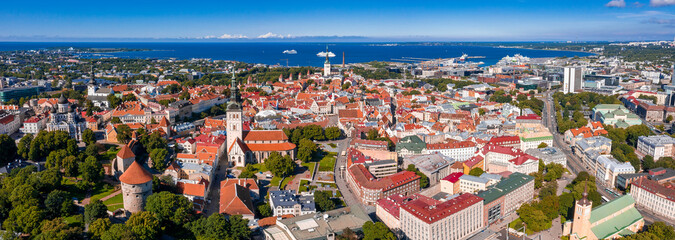 Amazing aerial drone shot of old town of Tallinn, Estonia at sunset