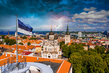 Amazing aerial drone shot of old town of Tallinn, Estonia at sunset