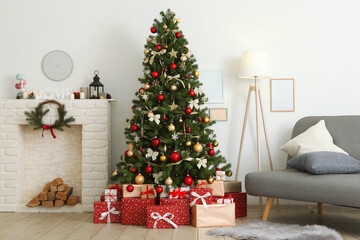 Fototapeta na wymiar Beautiful interior decorated for Christmas or New Year. Christmas tree and gifts. Place for text