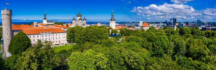 Amazing aerial drone shot of old town of Tallinn, Estonia at sunset