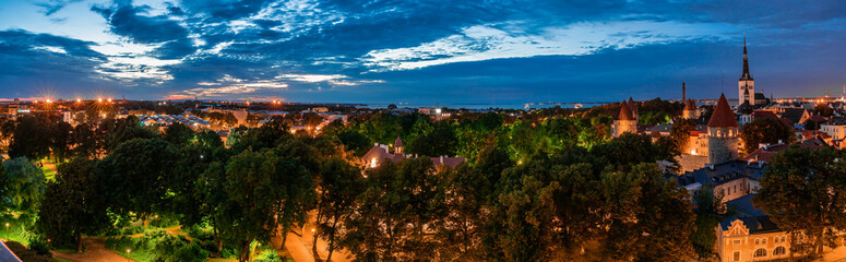 Amazing aerial drone shot of old town of Tallinn, Estonia at sunset