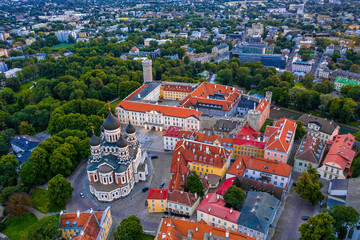 Amazing aerial drone shot of old town of Tallinn, Estonia at sunset