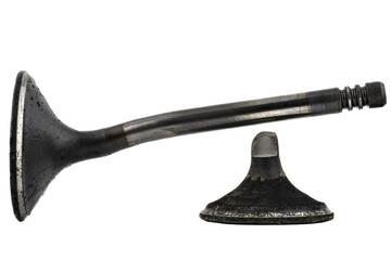 Warped and cracked engine valve spindle made of heat-resistant steel, covered with soot, isolated...