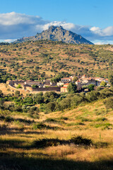 Beautiful view of the historic village of Idanha-a-Velha in Portugal, with the mountain and the village of Monsanto in the background, after a sunny day in the spring.