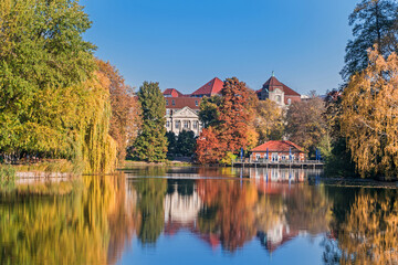 Park Lietzensee and buildings on the shore of Lake Lietzen in Berlin, Germany