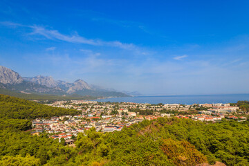 Fototapeta na wymiar View of Kemer town on a coast of the Mediterranean sea in Antalya province, Turkey. Turkish Riviera. View from a mountain