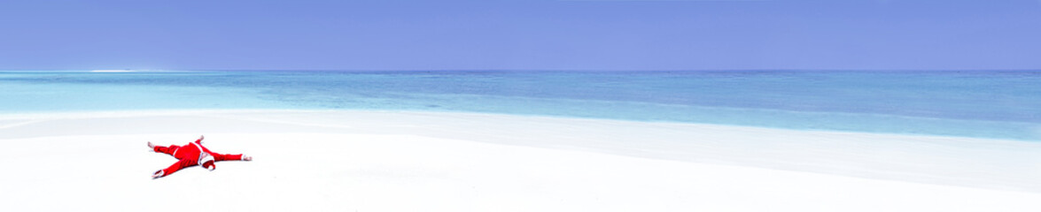 Santa Claus celebrate Christmas on sandy beach, relax and enjoy winter holidays at tropical destination