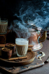 indian spicy tea masala, hot and delicious traditional drink of tea, milk and spices