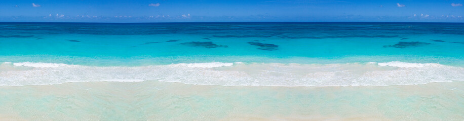 Wild tropical seashore with turquoise caribbean sea. Long banner