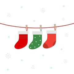 Christmas socks on snowflakes background. Merry Christmas greeting card.