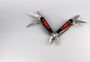 Multipurpose Tool - Multipurpose pliers, knife, screwdriver, hook, saw.