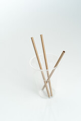 Bamboo drinking straws with Zero - waste. Ecological concept. Concept zero waste. Selective focus, copy space. white background.