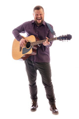 Mature musician plays acoustic guitar emotional studio portrait on white background.
