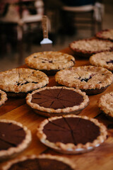 Assortment of pies on wooden table
