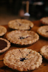 Assortment of pies on wooden table