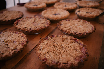 Assortment of pies on wooden table