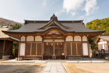 Naklejka premium Worship hall Takamefu shrine in Sanda city, Hyogo, Japan. Notes: Chinese characters on the plate mean the shrine name.