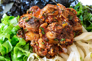 Korean food, Kkomag Bibimbab which is mixed with rice, vegetables and blood cockle