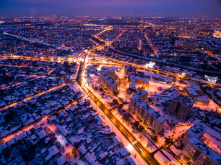 Fototapeta na wymiar Evening aerial view to residential area in Kharkiv with snow