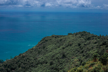 Natural high angle panoramic background With an atmosphere surrounded by mountains and trees, with a blurred wind, cool