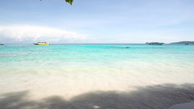 Aerial view of drone, Scene of Beautiful nature Top view of White beach sand in summer day, Seawater clear and blue green. Nature in Khai Iland. At Khai island, Phuket, Thailand. Nature and travel.