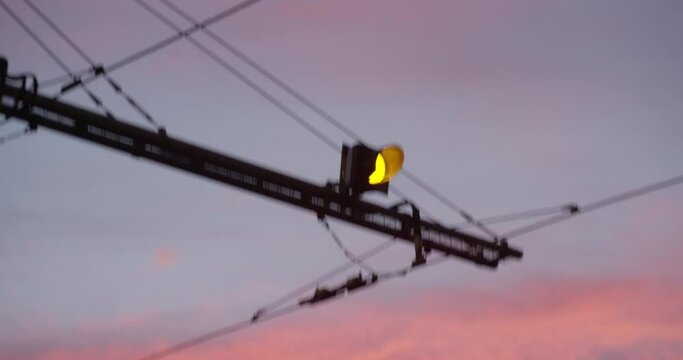 View of a train signalling with a beautiful pink sky in the background, montpellier south of france
