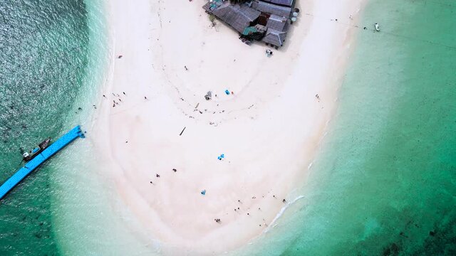 Aerial view of drone, Scene of Beautiful nature Top view of White beach sand in summer day, Seawater clear and blue green. Nature in Khai Iland. At Khai island, Phuket, Thailand. Nature and travel.