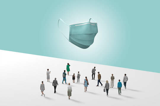 Surgical Mask Floating In Blue Space Above Crowd Of Mini Figurines . 3d Rendering.