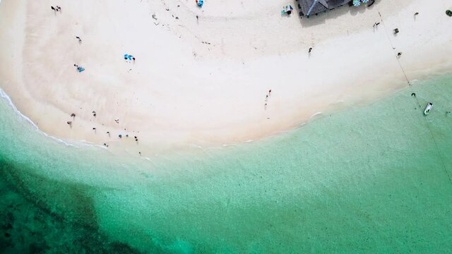 Aerial view of drone, Scene of Beautiful nature Top view of White beach sand in summer day, Seawater clear and blue green. Nature in Khai Iland. At Khai island, Phuket, Thailand. Nature and travel.